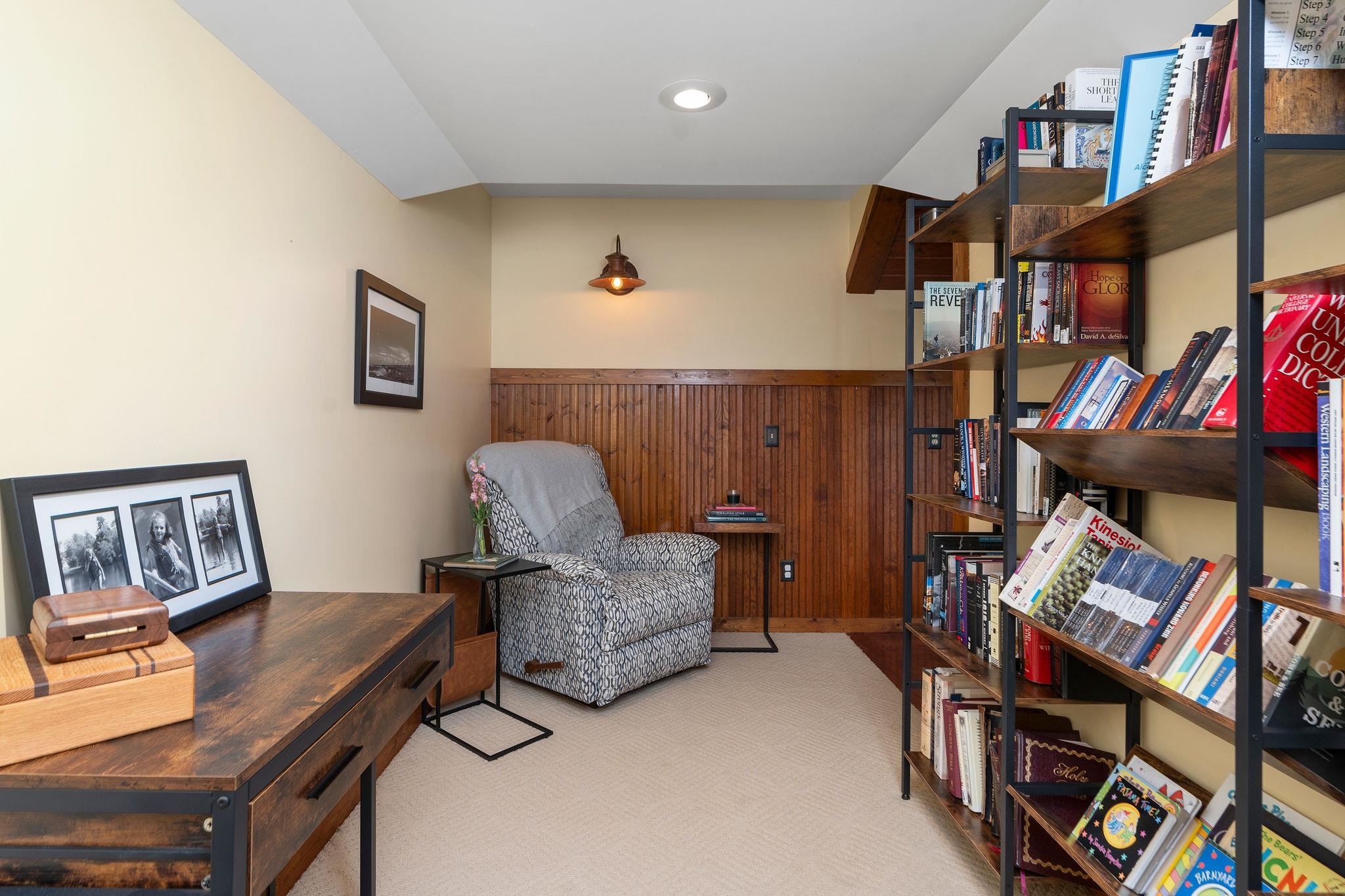 216 Lee Roy Road Grottoes, VA 24441 - Photo 44 of 64 a living room with furniture and a book shelf