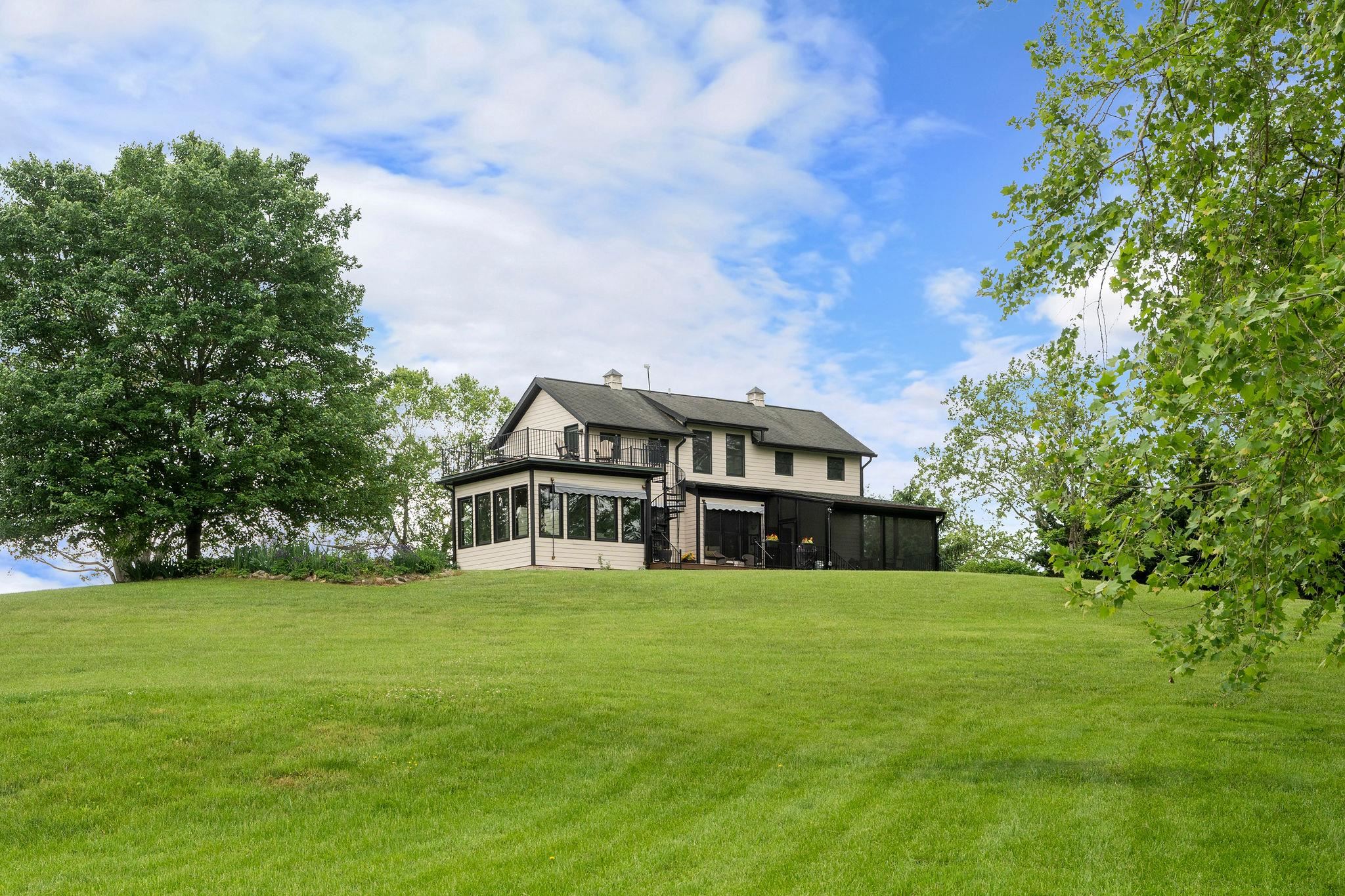 216 Lee Roy Road Grottoes, VA 24441 - Photo 49 of 64 a view of a house with a big yard and large trees