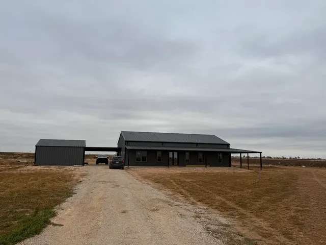 a view of a big room with wooden floor