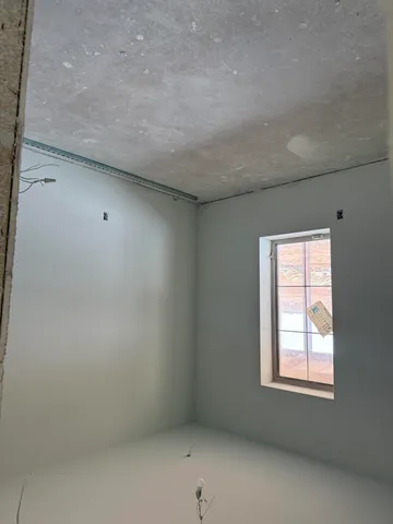 an empty room with a window