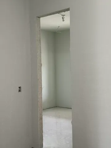 a front view of a house with a garage