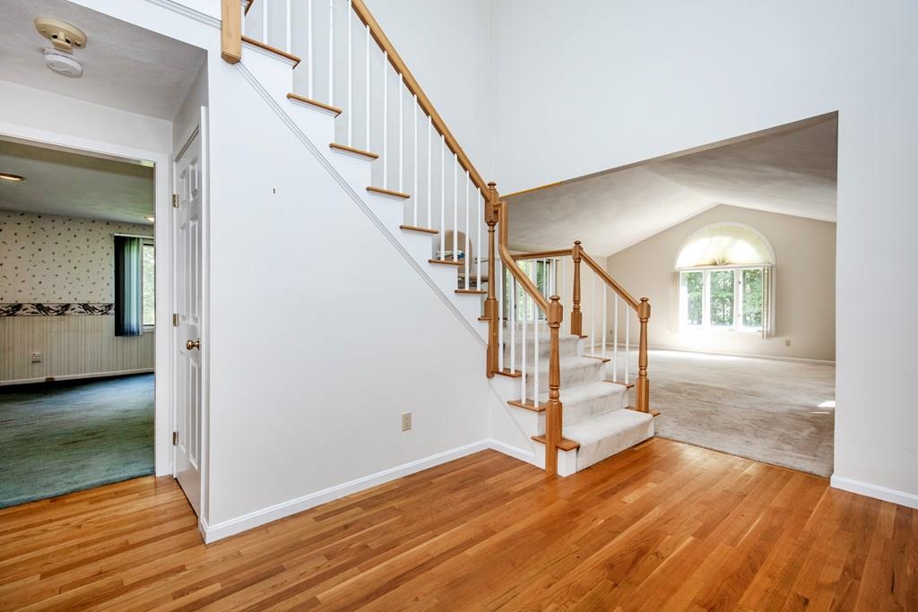 15 Arrowhead Farm Road Boxford, MA 01921 - Photo 3 of 25 a view of entryway and hall with wooden floor