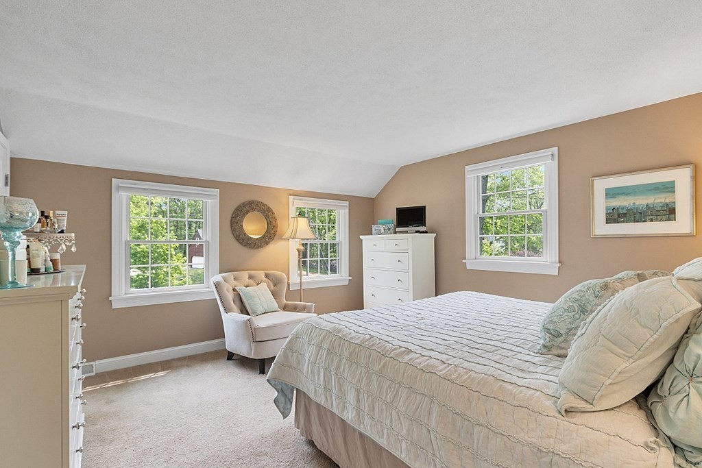 18 Higate Road Chelmsford, MA 01824 - Photo 23 of 39 a bedroom with a bed and a table