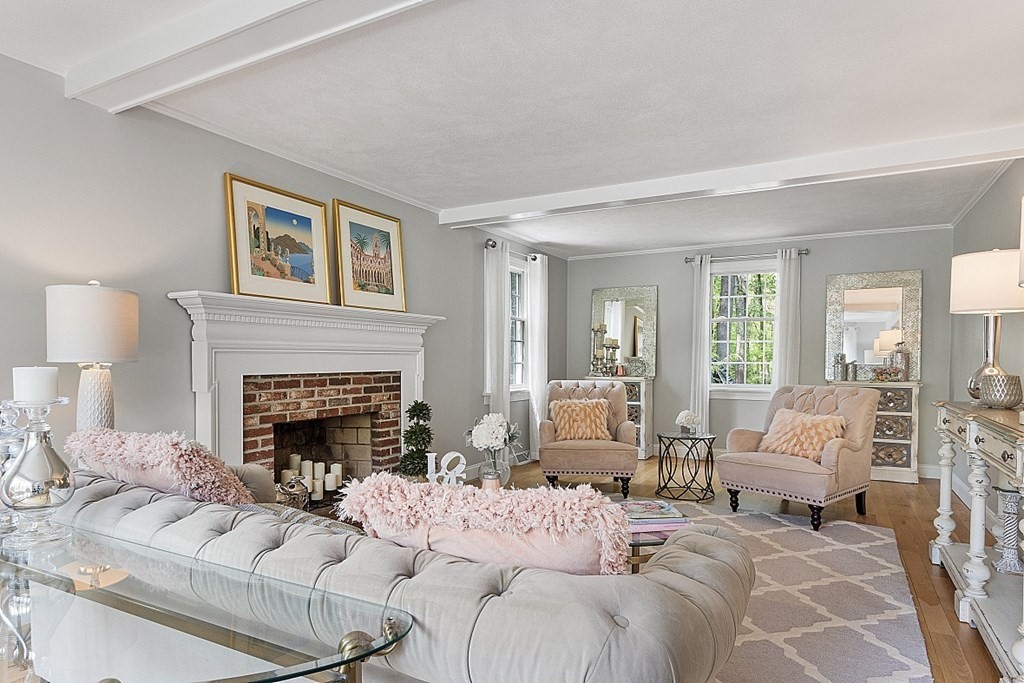 18 Higate Road Chelmsford, MA 01824 - Photo 5 of 39 a living room with furniture fireplace and a large window