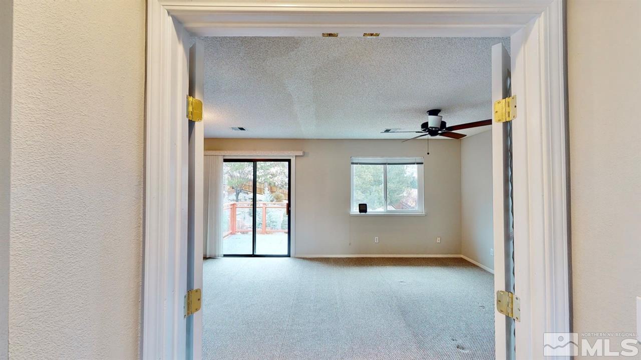 5380 Simons Drive Reno, NV 89523 - Photo 17 of 34 a view of an empty room with a window