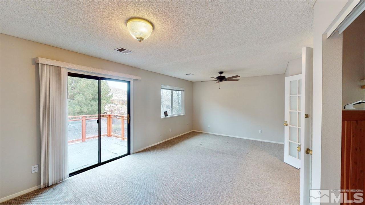5380 Simons Drive Reno, NV 89523 - Photo 18 of 34 a view of an empty room with a window