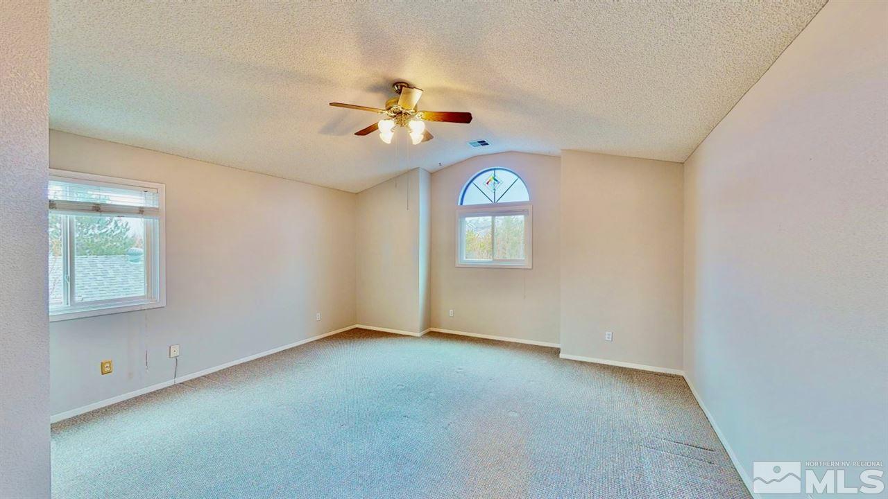5380 Simons Drive Reno, NV 89523 - Photo 21 of 34 a view of an empty room with a window