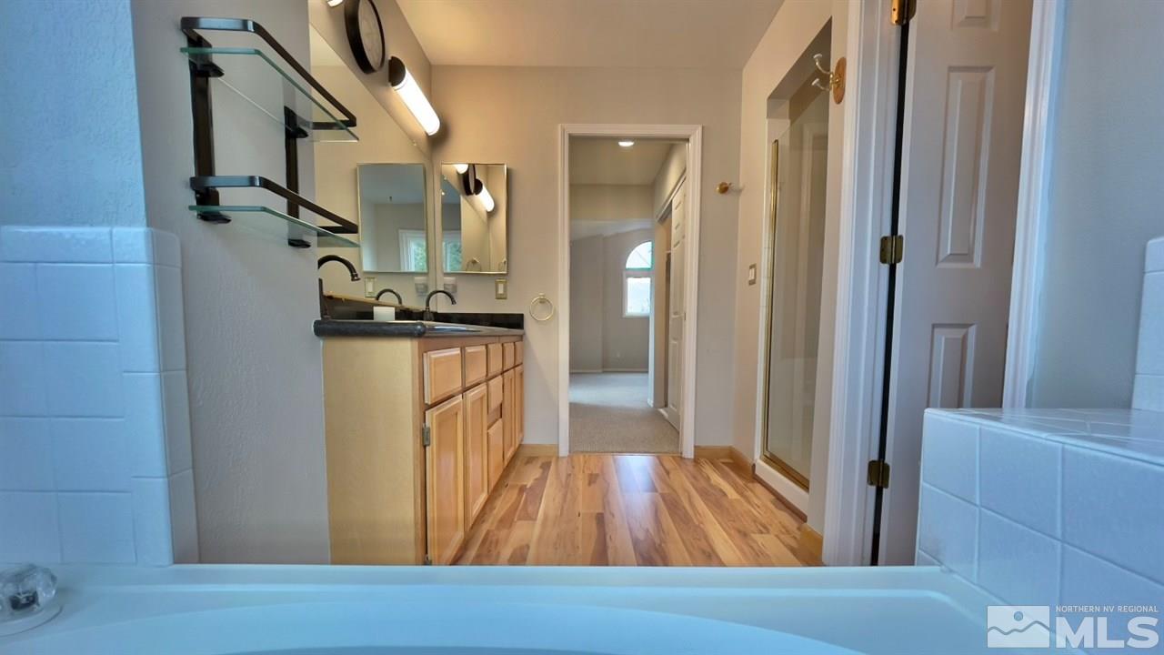 5380 Simons Drive Reno, NV 89523 - Photo 24 of 34 a view of a living room with furniture and wooden floor