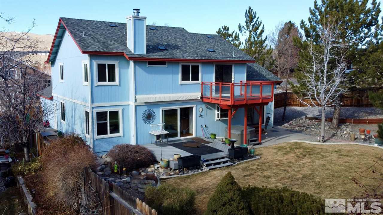5380 Simons Drive Reno, NV 89523 - Photo 26 of 34 a front view of house with yard outdoor seating and barbeque oven