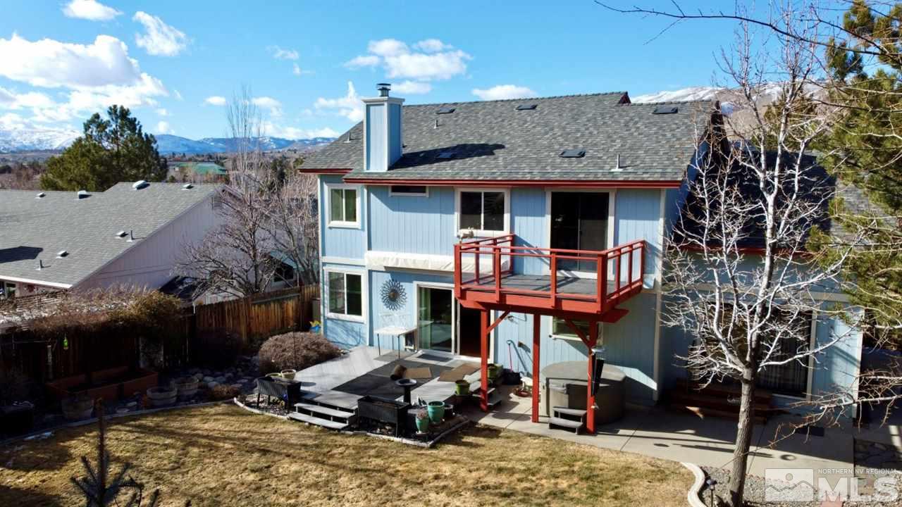 5380 Simons Drive Reno, NV 89523 - Photo 29 of 34 a front view of a house with a yard and outdoor seating