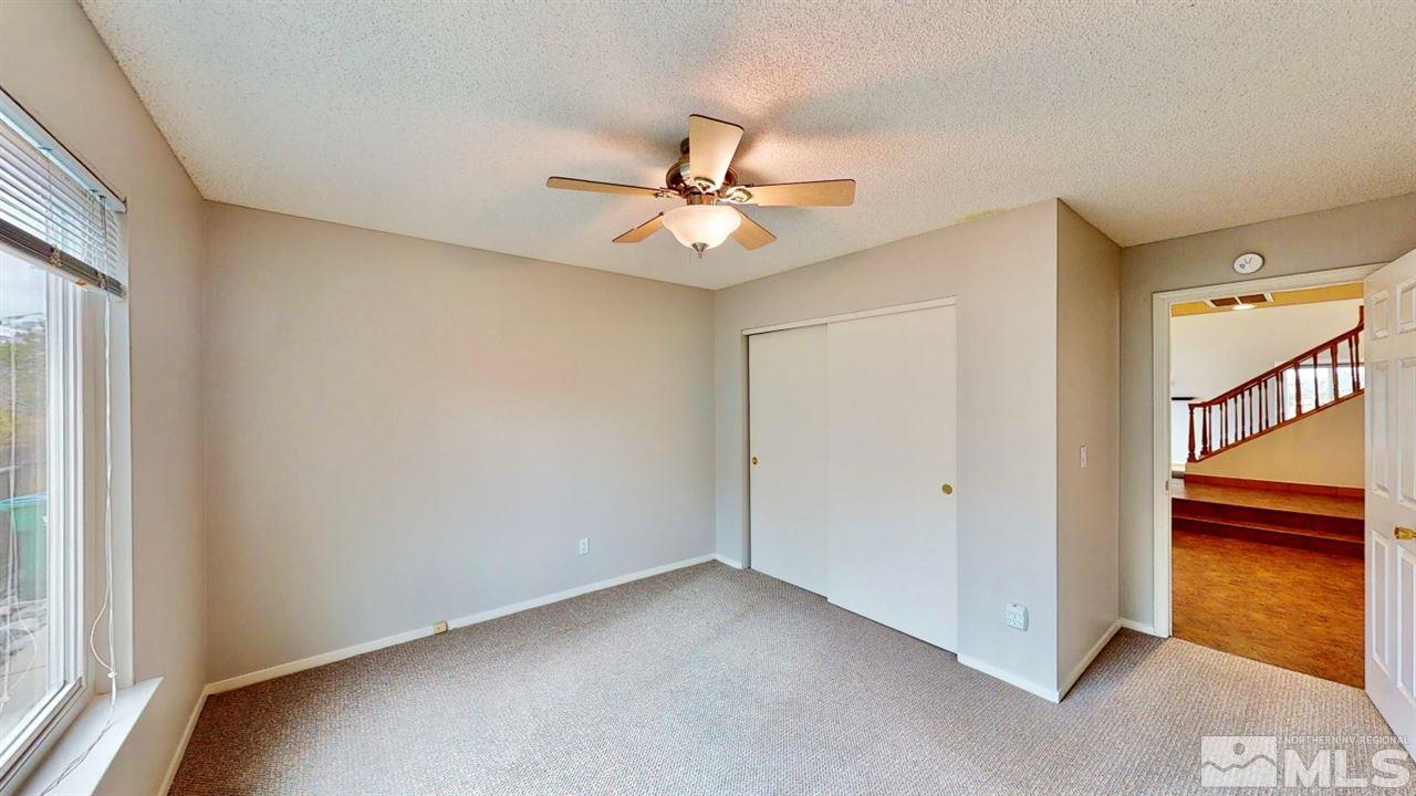 5380 Simons Drive Reno, NV 89523 - Photo 10 of 34 a view of an empty room with a window