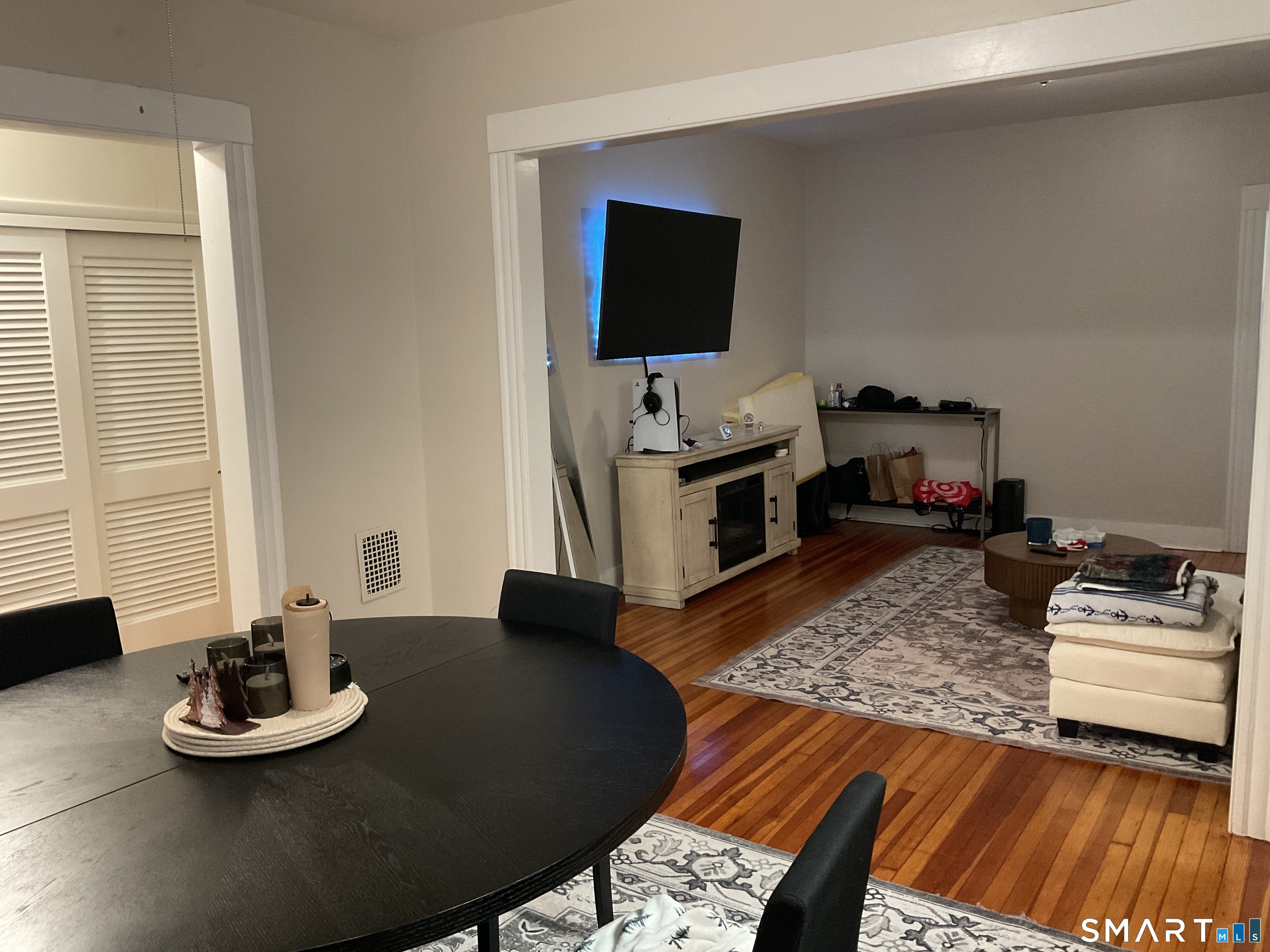 201 French Street Bridgeport, CT 06606 - Photo 15 of 30 a living room with furniture and a flat screen tv