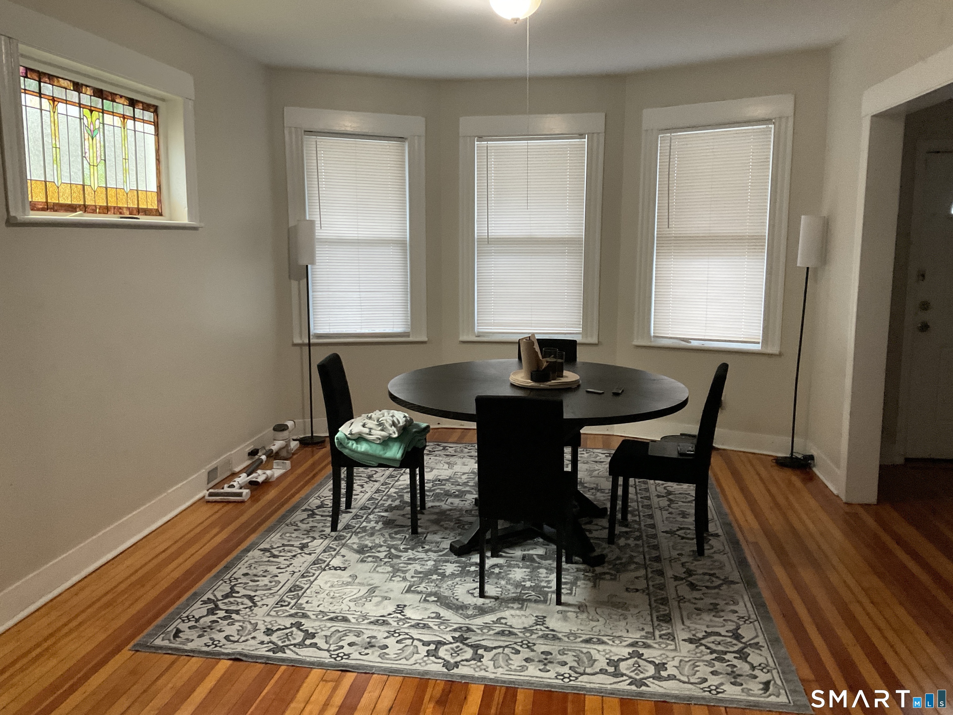 201 French Street Bridgeport, CT 06606 - Photo 16 of 30 a view of a dining room with furniture and wooden floor