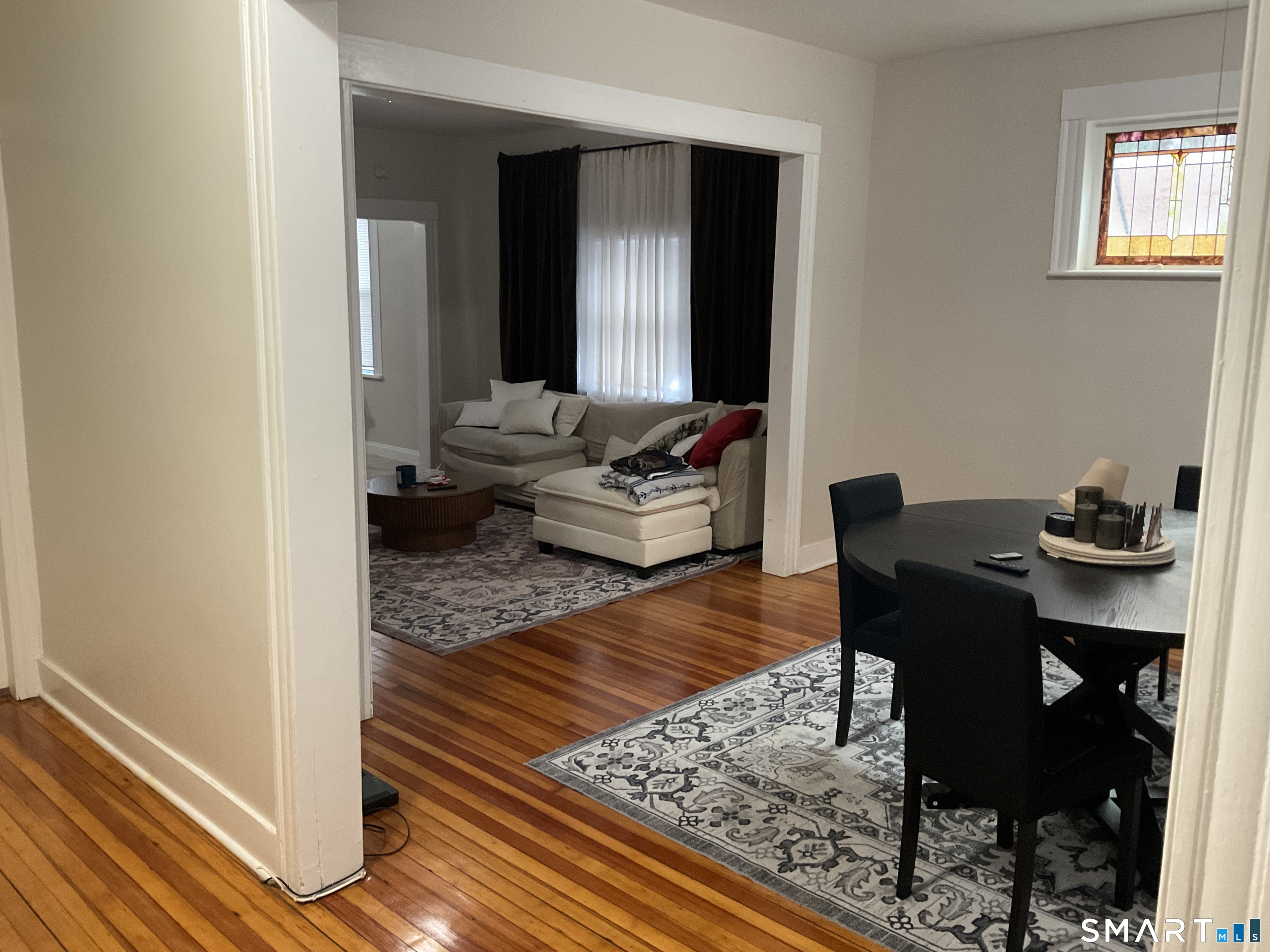 201 French Street Bridgeport, CT 06606 - Photo 17 of 30 a living room with furniture and a rug