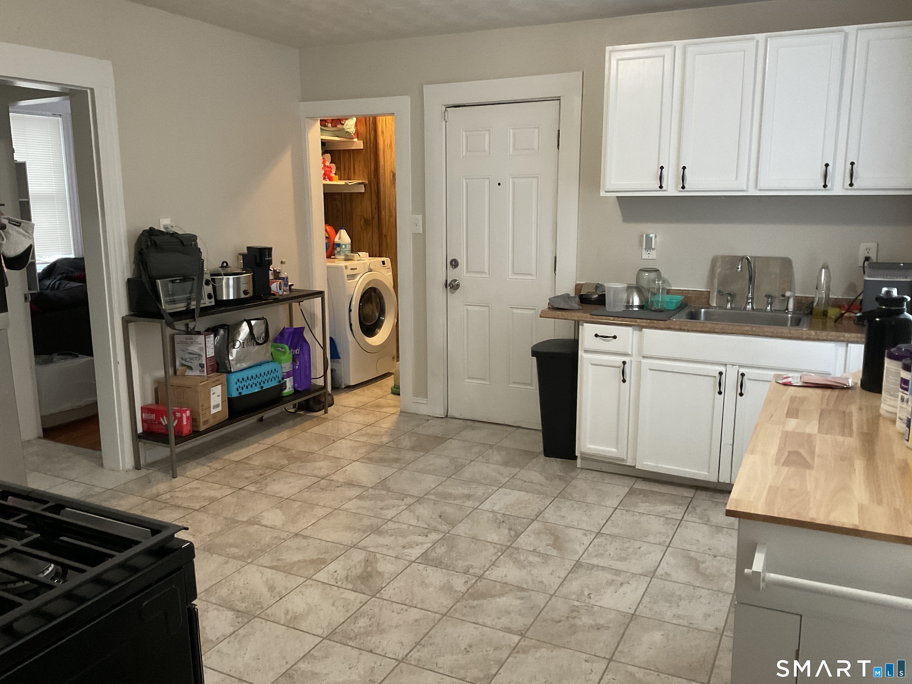 201 French Street Bridgeport, CT 06606 - Photo 18 of 30 a kitchen with stainless steel appliances granite countertop a stove and a refrigerator
