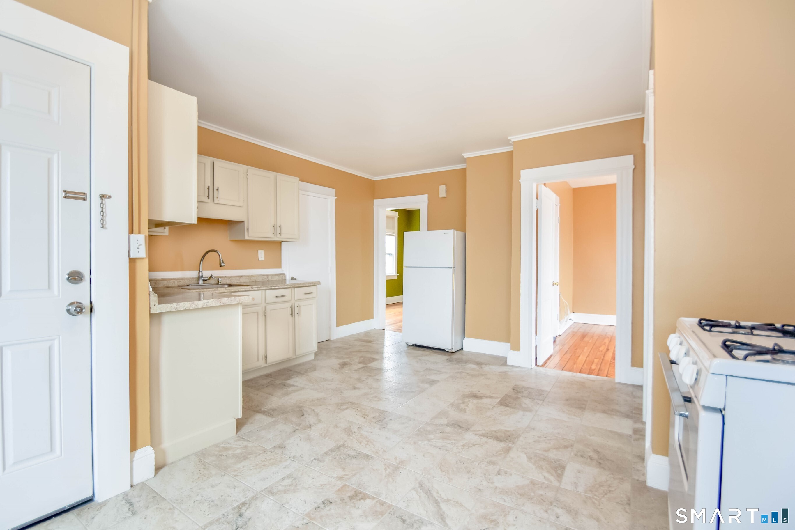 201 French Street Bridgeport, CT 06606 - Photo 3 of 30 a view of kitchen with refrigerator cabinets and furniture