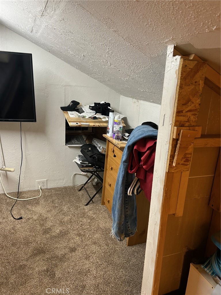3393 Eucalyptus Avenue Riverside, CA 92507 - Photo 15 of 16 a view of walk in closet with clothes and shoes