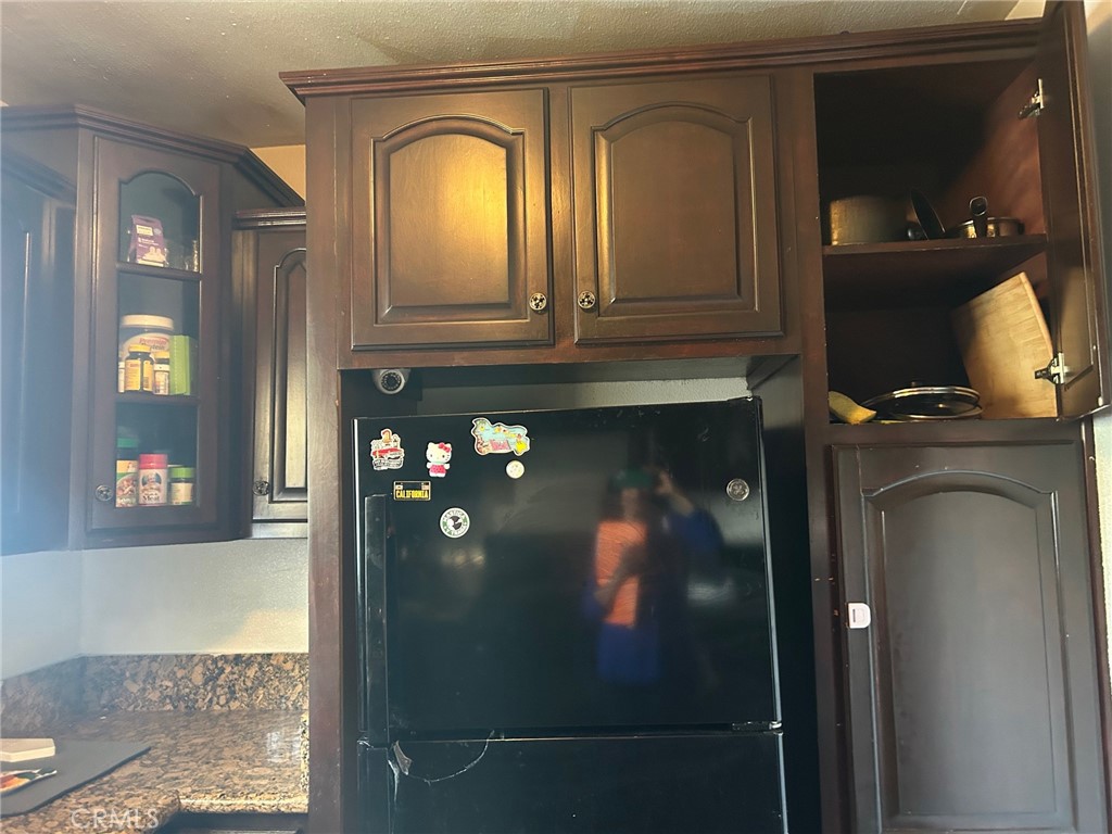 3393 Eucalyptus Avenue Riverside, CA 92507 - Photo 6 of 16 a view of a entryway door of the house and living room