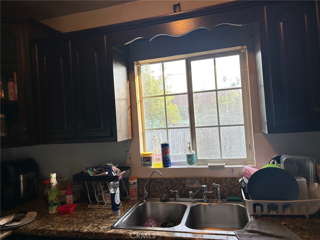 3393 Eucalyptus Avenue Riverside, CA 92507 - Photo 8 of 16 a kitchen with a sink and a window