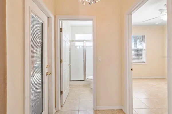 a view of a bathroom from the hallway