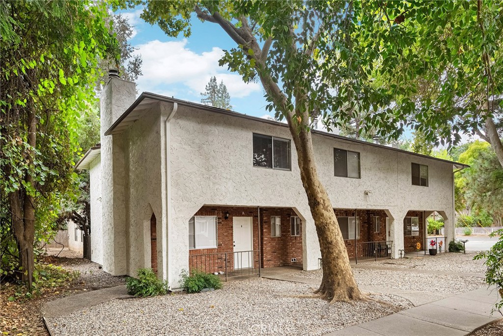 403 Maple Street Chico, CA 95928 - Photo 3 of 18 a front view of a house with a garden