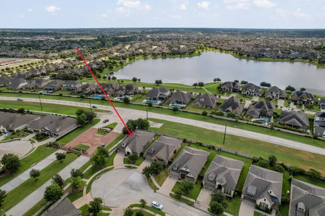 an aerial view of a city with houses