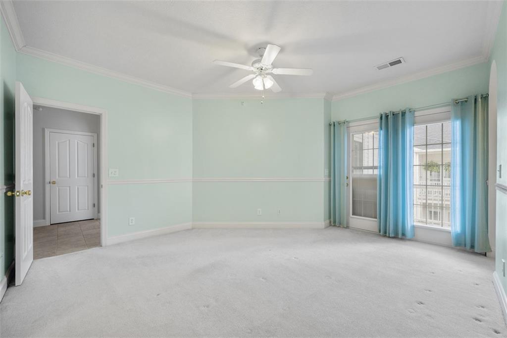 246 Adams Pointe Boulevard, Unit 1 Mars, PA 16046 - Photo 22 of 37 a view of a big room with windows and chandelier fan