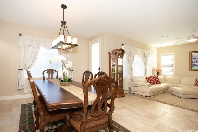 a view of a livingroom with furniture and window