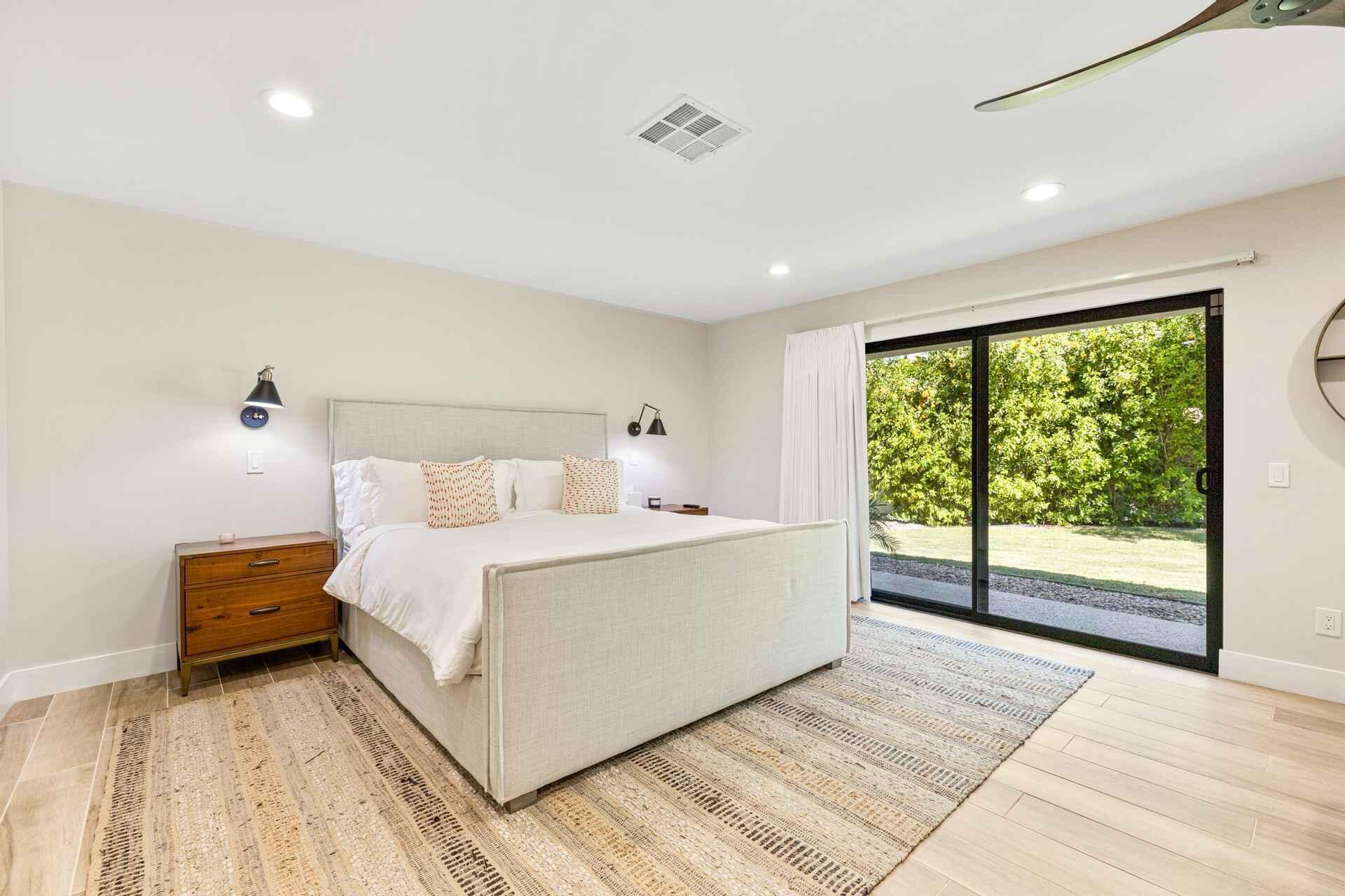 45655 Apache Road, Unit SHARE E Indian Wells, CA 92210 - Photo 21 of 31 a bed room with a bed and a large window