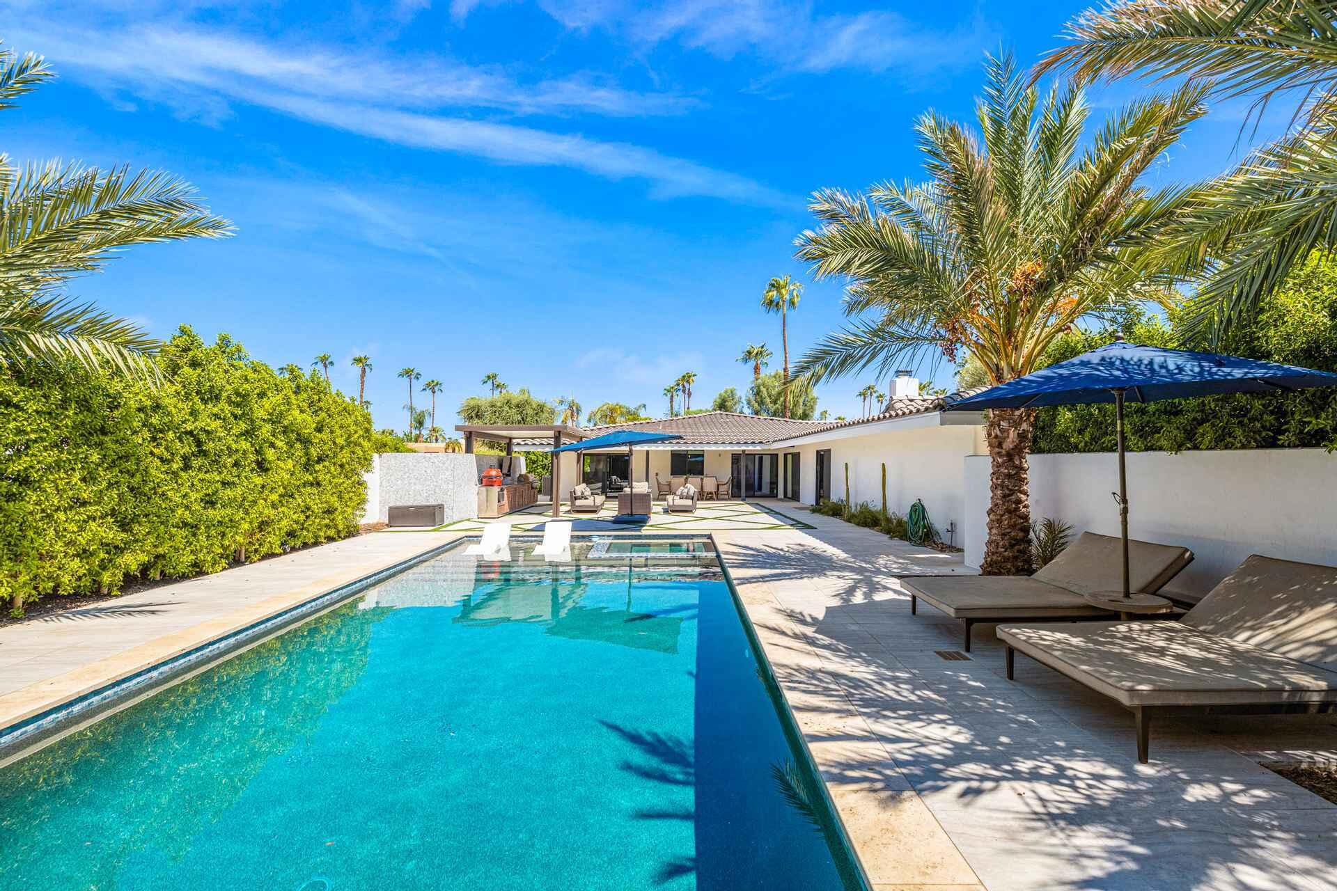 45655 Apache Road, Unit SHARE E Indian Wells, CA 92210 - Photo 30 of 31 a view of a swimming pool with a patio