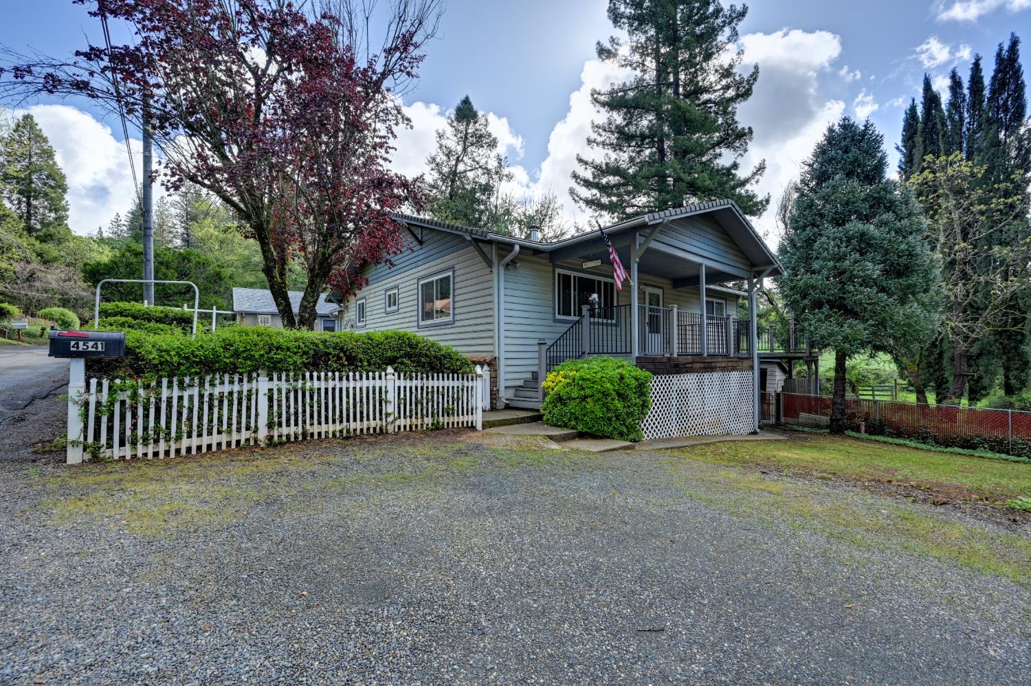 4541 Meadowbrook Road Garden Valley, CA 95633 - Photo 16 of 71 view of front facade featuring covered porch