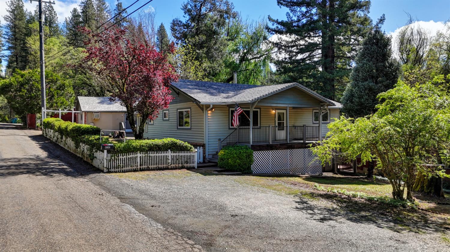 4541 Meadowbrook Road Garden Valley, CA 95633 - Photo 4 of 71 ranch-style house featuring a porch and driveway