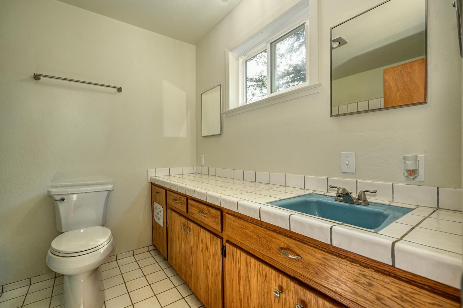 4541 Meadowbrook Road Garden Valley, CA 95633 - Photo 51 of 71 bathroom with vanity and light tile patterned floors