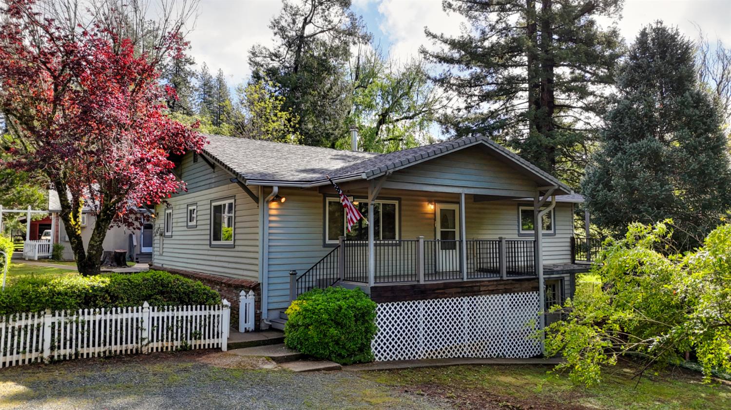 4541 Meadowbrook Road Garden Valley, CA 95633 - Photo 53 of 71 view of front of home with covered porch and stairway