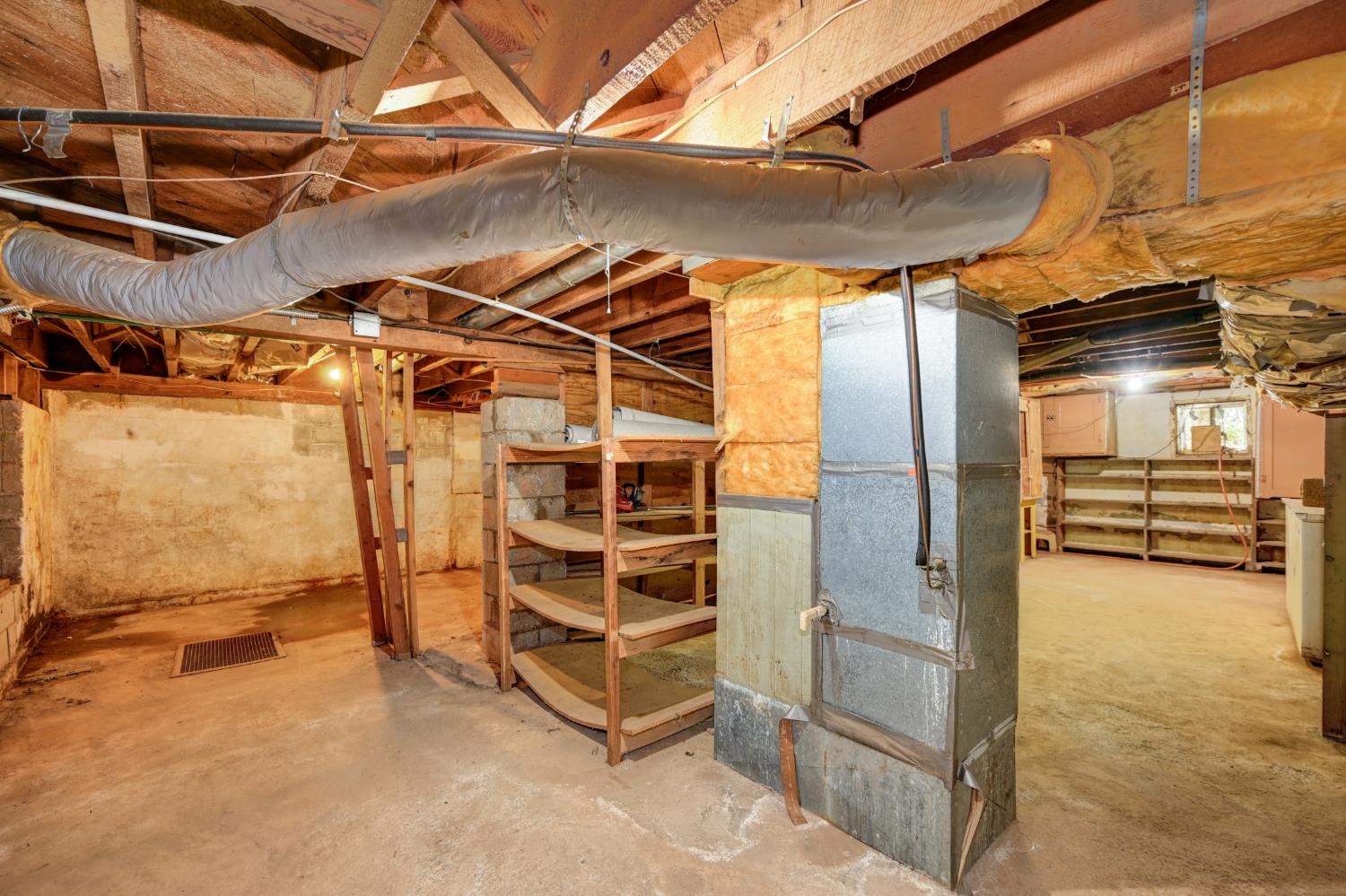 4541 Meadowbrook Road Garden Valley, CA 95633 - Photo 60 of 71 unfinished below grade area with heating unit