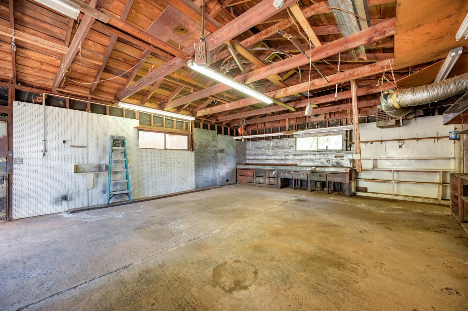 4541 Meadowbrook Road Garden Valley, CA 95633 - Photo 64 of 71 garage with a workshop area