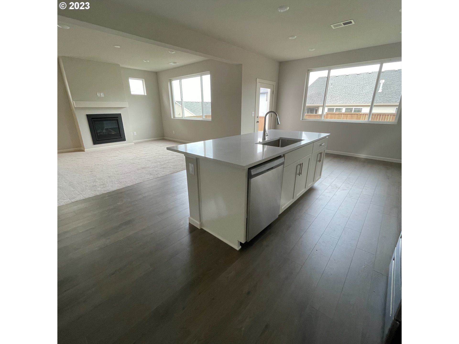 2083 Southeast Pheasant Avenue Gresham, OR 97080 - Photo 19 of 30 a large white kitchen with a large window