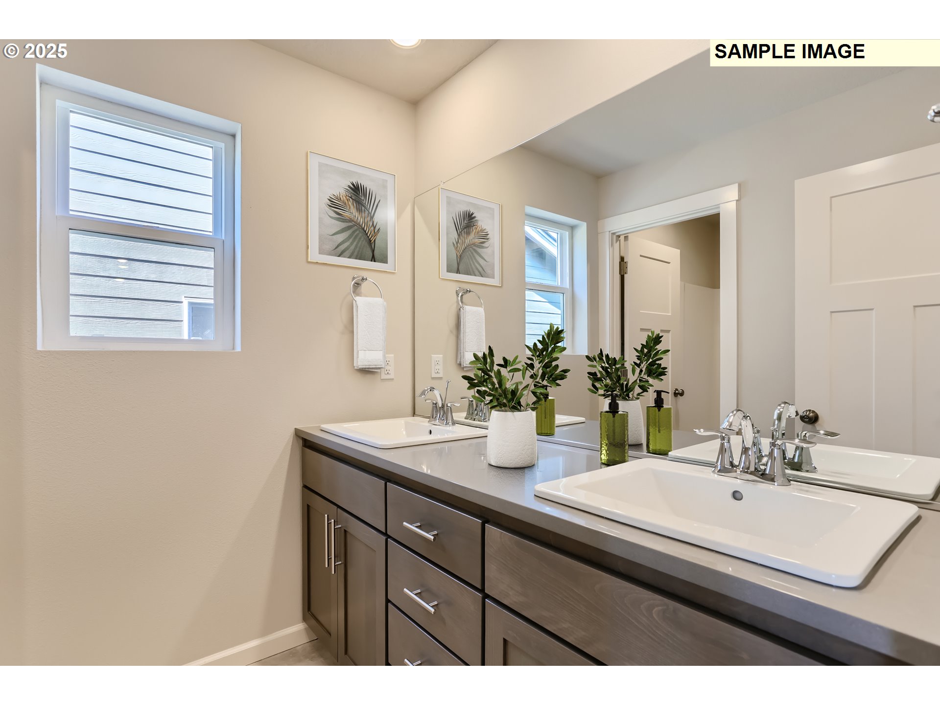 2083 Southeast Pheasant Avenue Gresham, OR 97080 - Photo 30 of 30 a bathroom with a sink and a mirror