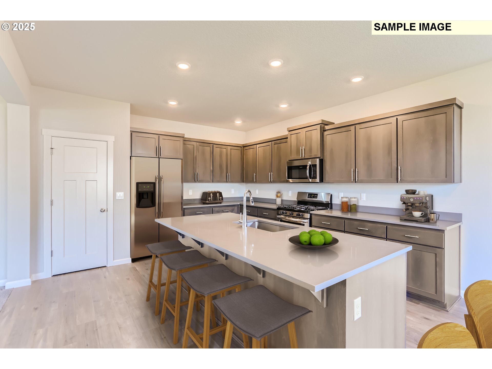 2083 Southeast Pheasant Avenue Gresham, OR 97080 - Photo 5 of 30 a kitchen with stainless steel appliances a sink and a stove