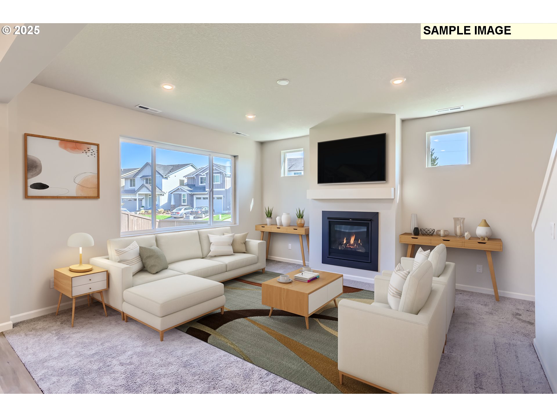 2083 Southeast Pheasant Avenue Gresham, OR 97080 - Photo 8 of 30 a living room with furniture a flat screen tv and a fireplace