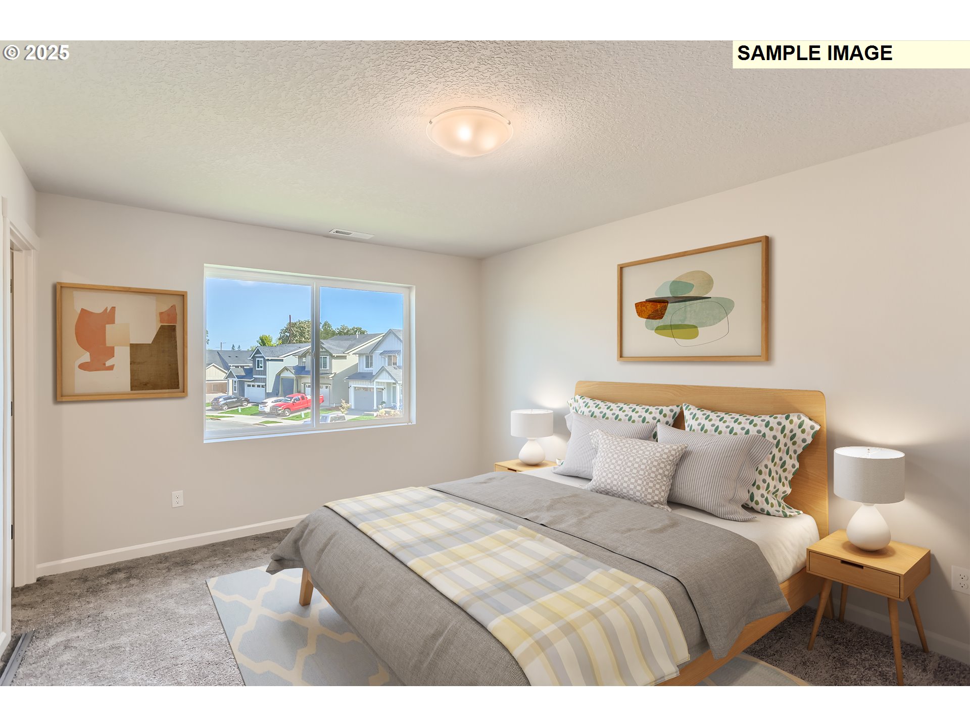 2083 Southeast Pheasant Avenue Gresham, OR 97080 - Photo 9 of 30 a bedroom with a bed and a painting on the wall