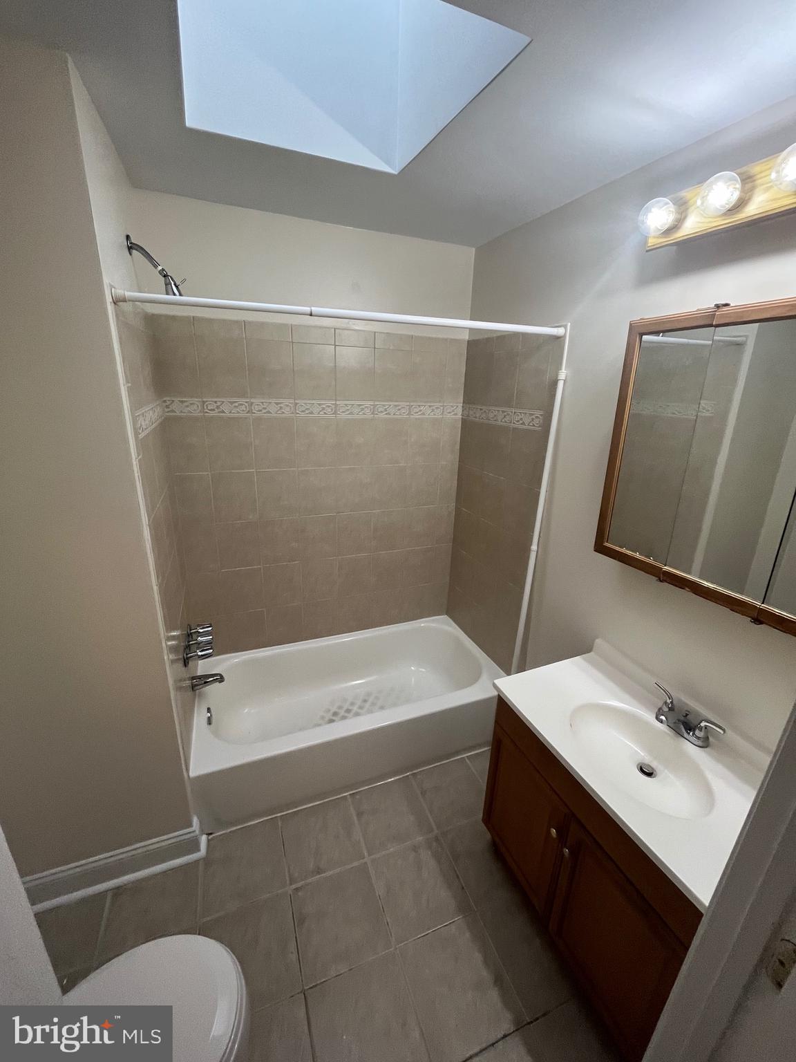 1634 Chilton Street Baltimore, MD 21218 - Photo 12 of 18 a bathroom with a bathtub sink and toilet