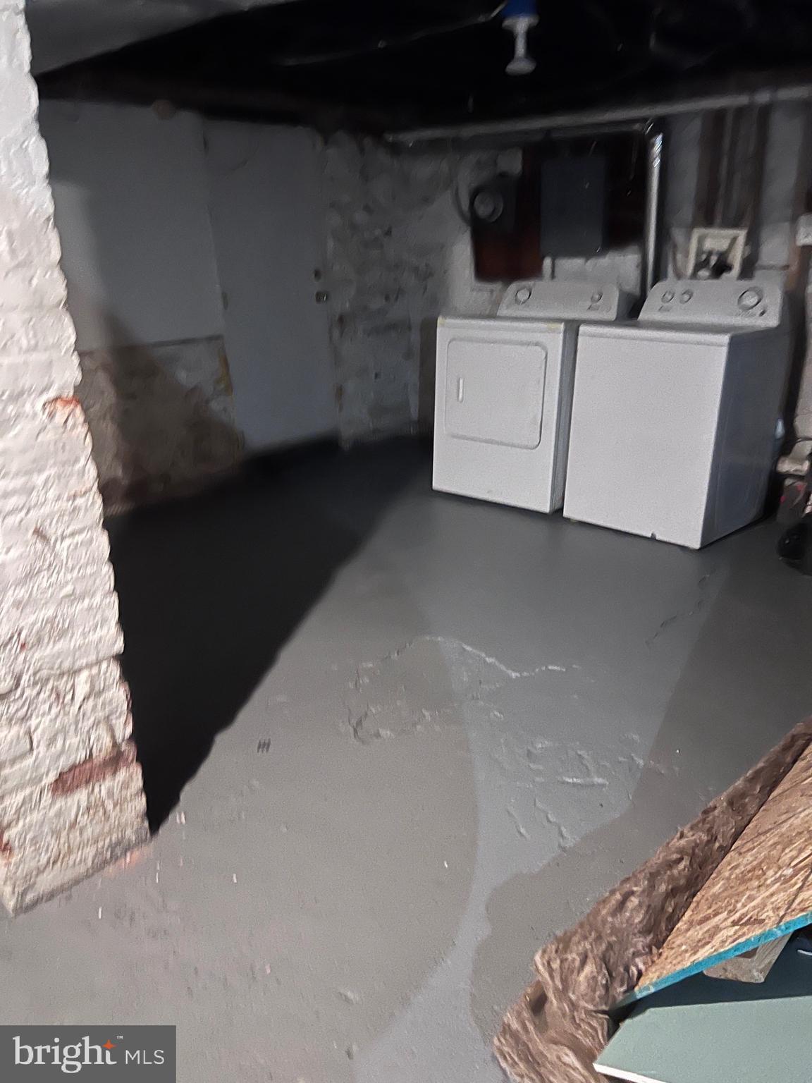 1634 Chilton Street Baltimore, MD 21218 - Photo 17 of 18 a utility room with dryer and washer