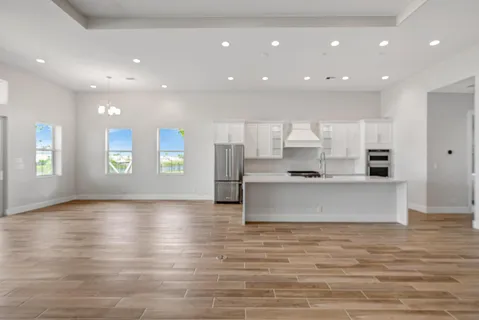 a white bath tub sitting in a bathroom