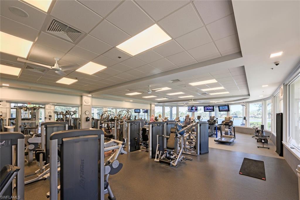 4231 Redonda Lane Naples, FL 34119 - Photo 23 of 28 a view of a room with gym equipment