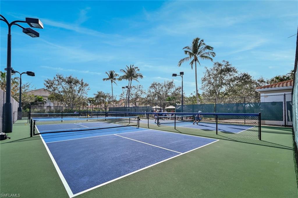 4231 Redonda Lane Naples, FL 34119 - Photo 25 of 28 a view of a tennis court