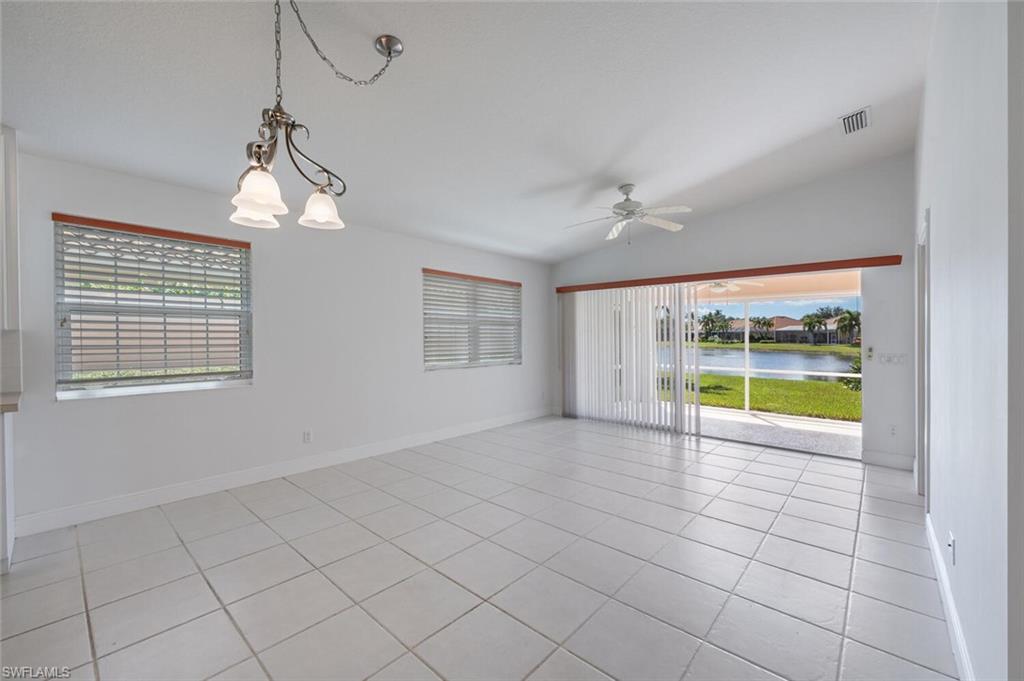 4231 Redonda Lane Naples, FL 34119 - Photo 9 of 28 a view of an empty room with a window