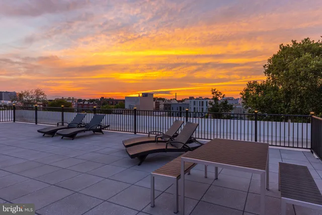 a view of a terrace with furniture