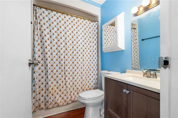 a bathroom with a sink and a toilet