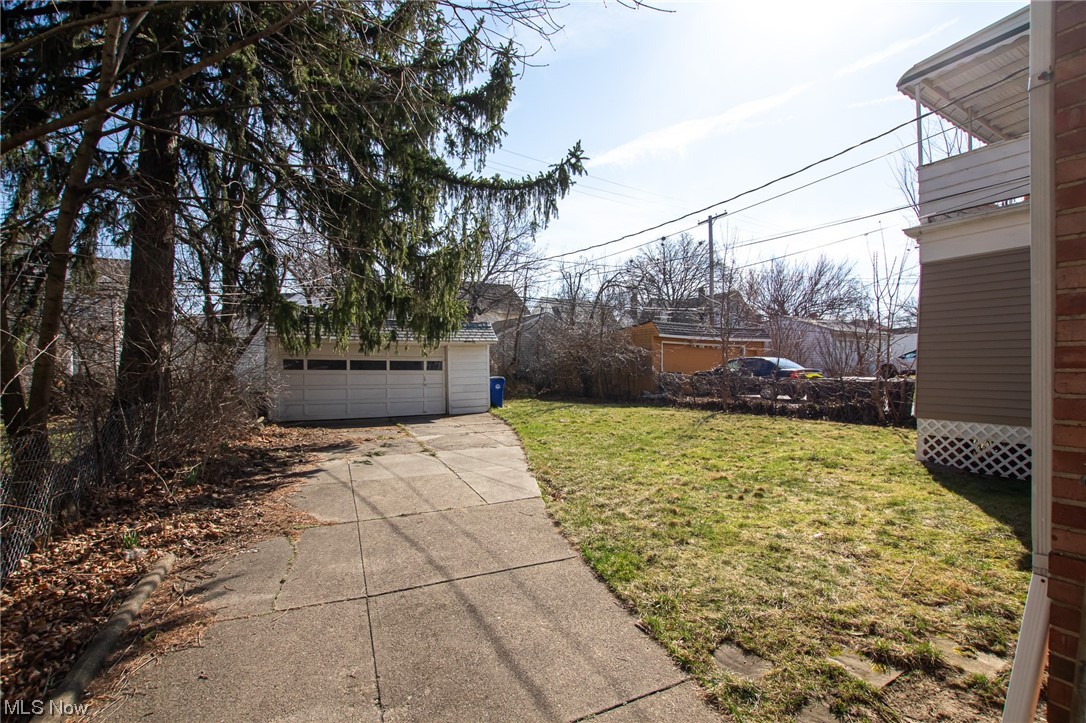 3423 Westbury Road Cleveland, OH 44120 - Photo 2 of 38 View of yard featuring a garage